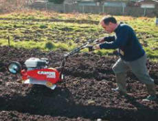 tilling a garden is hard work